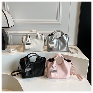 Group display of chic glossy tote bags in beige, silver, black, and pink colors