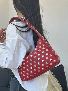 Vibrant red studded shoulder bag with silver rivets and litchi texture leather for women