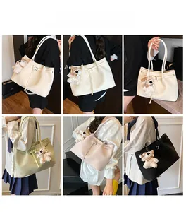 Detail shots of minimalist tote bags in four colors with cute plush puppy charms