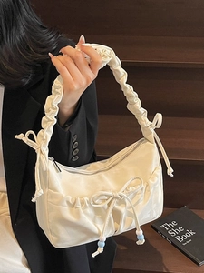 Borsa sottobraccio plissettata bianca alla moda con fiocco e perline colorate per l'estate
