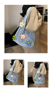 Detail of light blue hollow crochet tote bag featuring 3D colorful knit flowers
