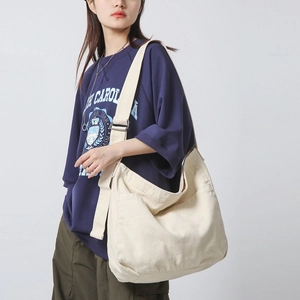 Large capacity cream canvas messenger bag with adjustable wide strap in casual Japanese style