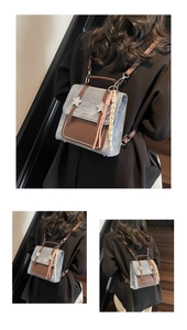 Detail of retro color-block backpack showing star buckles and striped tassel charm