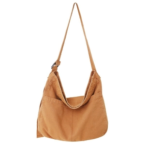 Large khaki canvas hobo bag with adjustable strap in minimalist Japanese style