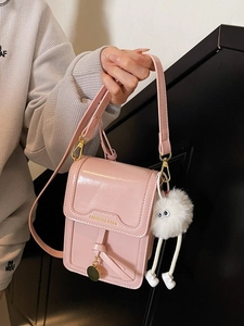 Petit sac à bandoulière rose brillant pour téléphone avec breloque en peluche