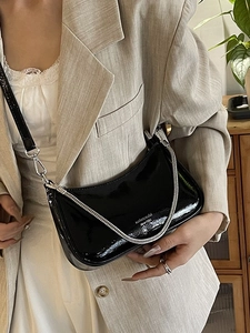 Elegant black patent leather underarm bag with silver chain and dual straps for women