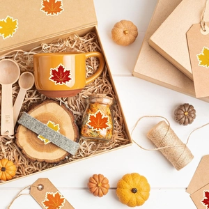Autumn maple leaf gift set with ceramic mug glass jar wood spoon and coaster in a kraft box