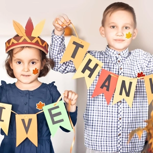 Give Thanks banner set with autumn maple leaf stickers and festive feather headband