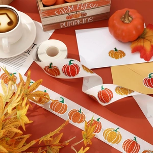 Detail of glitter pumpkin stickers on envelopes with autumn farm-themed decor
