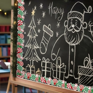 Close-up of red and green peppermint candy scalloped border stickers on a black chalkboard
