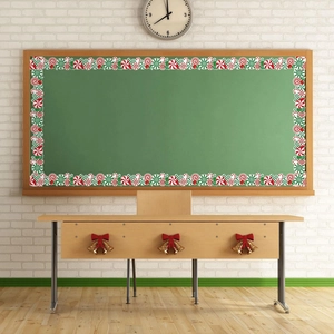 Christmas peppermint bulletin board border showing red and green candy cane decor on blackboard