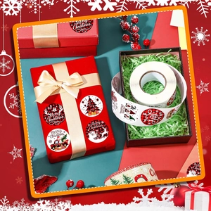 Roll of Merry Christmas stickers featuring Santa, deer, and snowflakes on gift boxes