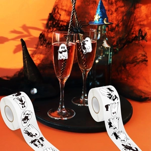Detailed view of Halloween ghost and cat stickers applied on glassware for party decoration