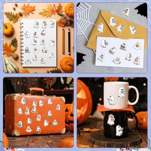 Autocollants de fantômes sur carnet et valise avec décorations d'Halloween