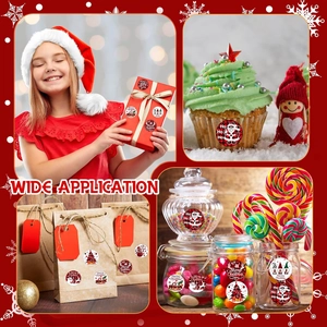 Wide application showing Merry Christmas round stickers on gift boxes and cupcakes