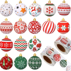 Roll of 500 Christmas stickers featuring reindeer, snowflakes and trees for gift wrapping