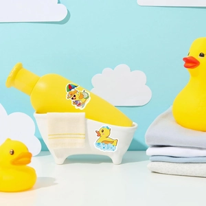 Cute cartoon duck stickers on a yellow water bottle and mini bathtub display