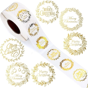 Roll of transparent gold foil Christmas wreath stickers with Merry Christmas text labels
