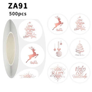 Détail de 500 autocollants de Noël en or rose avec motifs de renne et de sapin