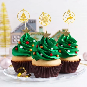 Golden Christmas cupcake toppers with reindeer, snowflake, and tree shapes for festive parties