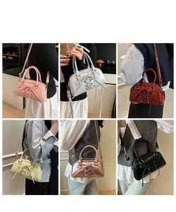 Detailed grid view of textured woven handbag in six colors with crossbody straps