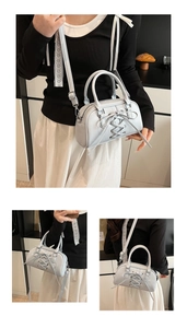 Detailed views of light blue crossbody bag with unique crossover drawstring design