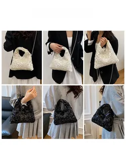 Detailed views of sparkling sequin handbags in black and white with metal chain straps