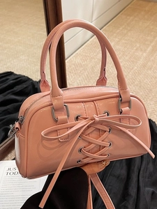 Pink minimalist lace-up bow handbag with silver hardware and detachable shoulder strap
