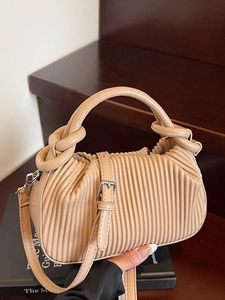 Chic beige pleated square handbag with knot handle and adjustable crossbody strap