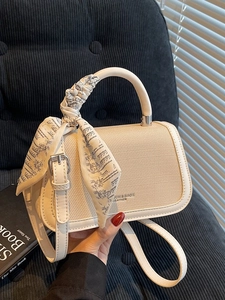 Fashionable beige texture small square handbag with decorative scarf and shoulder strap