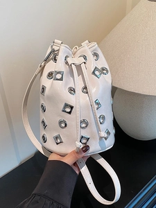 Fashion Large Capacity PU Leather Bucket Bag For Women Metal Grommets Rivet Hollow Out Drawstring Shoulder Crossbody Bag