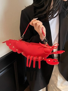 Cute red lobster shaped crossbody bag for women made of PU leather with gold hardware