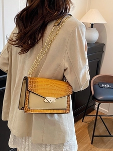 Retro crocodile pattern crossbody bag with yellow and grey patchwork and gold chain strap