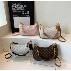 Detailed collection of hobo bags in four colors with geometric pattern and gold chain