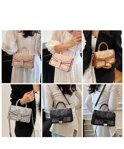 Multiple carrying styles showing embroidered floral shoulder bags in various colors
