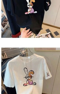 Detail showing the colorful cartoon rabbit print and NFMN lettering on a cotton T-shirt
