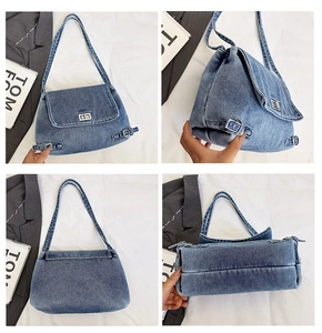 Détails du sac bandoulière en denim bleu avec fermoir rotatif argenté et boucles