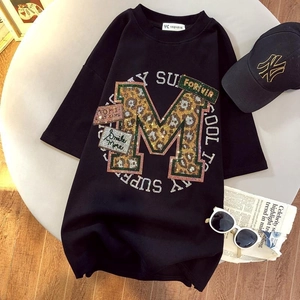 T-shirt oversize en coton noir avec logo M léopard et lettrage en strass brillants