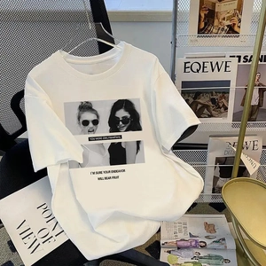 Detail of white cotton T-shirt featuring high-quality portrait print and ribbed crew neck