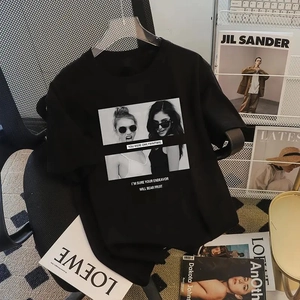 Women's black oversized cotton T-shirt featuring stylish fashion portrait prints