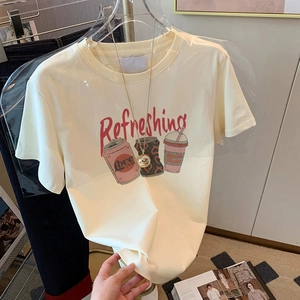 Damen Baumwoll T-Shirt in Creme mit rotem Refreshing Aufdruck und Cartoon Motiven