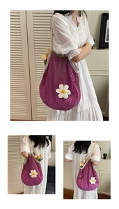 Detail of purple cotton mesh shopping bag with green trim and a crochet daisy flower