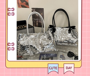 Detail of silver sequin tote bags featuring reflective square textures and long straps