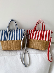 Striped canvas and straw tote bags in red and blue with adjustable shoulder straps