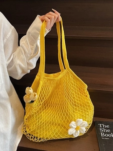 Yellow cotton mesh tote bag with white crochet daisy flower and long handles