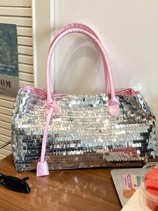 Glittery silver sequin tote bag with pink leather handles and summer accessories