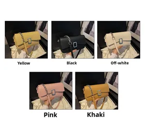 Detail view of five trendy leather crossbody bags with silver buckles in various colors