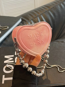 Pink gradient heart-shaped mini crossbody bag with metal bead handle and silver chain