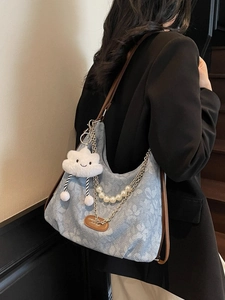 Denim blue floral tote bag with leather straps, metal chains and pearl charms
