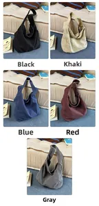 Collection of large washed canvas tote bags shown in black, khaki, blue, red, and grey tones